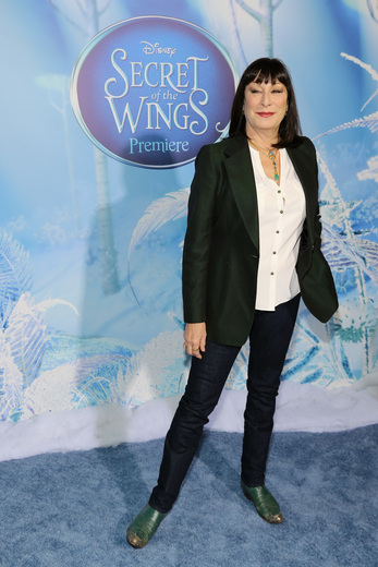 angelica huston at the Tinkerbell secret of the wings new york movie premiere with mike tyson angelica huston matt lanter timothy dalton mae whitman