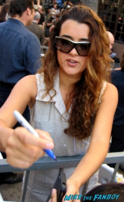 Cote de Pablo signing autographs at Mark Harmon's walk of fame star ceremony in hollywood