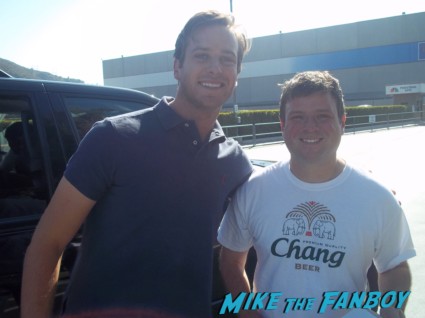 Armie Hammer signing autographs fan photo with mike the fanboy writer billy beer after a talk show hot sexy social network star
