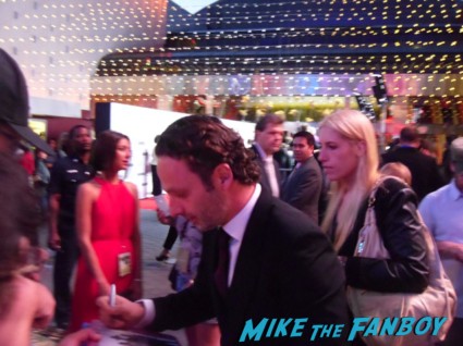 sexy norman reedus and Andrew lincoln  signing autographs for fans at the walking dead season 3 premiere at universal citywalk andrew lincoln rare promo hot