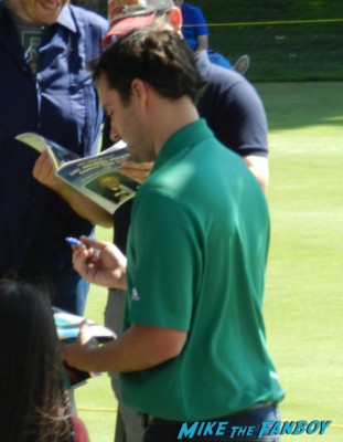 jake johnson from new girl signing autographs for fans at the los angeles police golf tournament signed photo poster rare promo