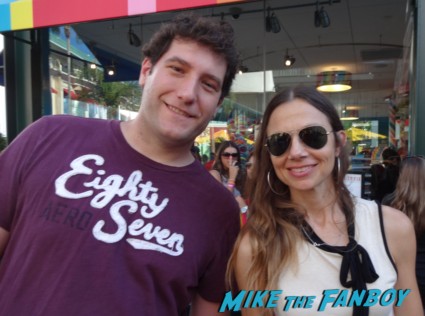 justine bateman from Family Ties poses with mike the fanboy for a photo at the dylans candy bar store opening