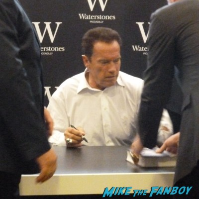Arnold Schwarzenegger signing autographs at his book signing at waterstons in london the uk rare promo book signing
