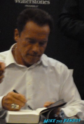 Arnold Schwarzenegger signing autographs at his book signing at waterstons in london the uk rare promo book signing