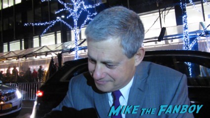Sir Cameron Mackintosh signing autographs for fans at the les miserables premiere in new york city rare promo signed