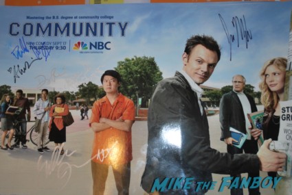 Community cast signed autograph cast photo with Joel Mchale ken jeong chevy chase Childish Gambino concert aka: Donald Glover signing autographs for fans rare promo signed photo concert marquee oakland ca marquee hot community star rare promo 