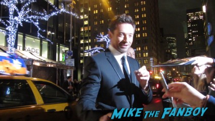 hugh jackman signing autographs for fans at the les miserables movie premiere in new york city rare