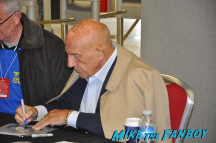 Sir Stirling Moss signing autographs for fans at collectormania in london rare formula 1 race car driver 