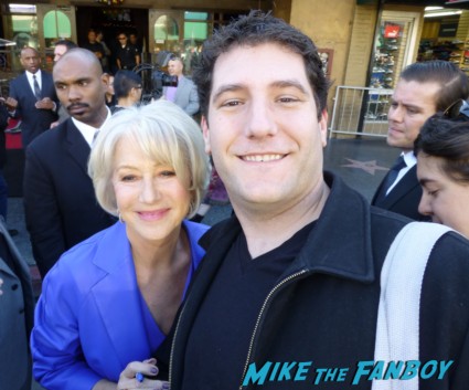 helen mirren posing for a fan photo helen mirren signing autographs for fans at her walk of fame star ceremony signed autograph rare promo hollywood signing autograph walk of fame star ceremony 001