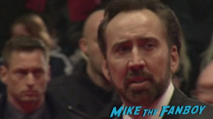 nicholas cage at the croods berlin film festival world movie premiere with emma stone nicholas cage signing autographs rare promo red carpet photo