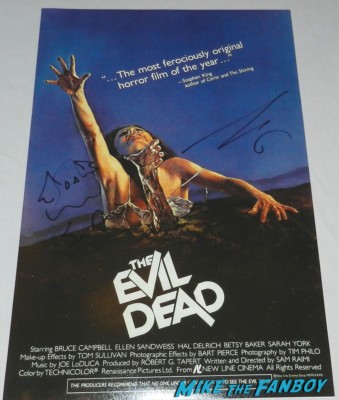sam Rami bruce campbell signed autograph evil dead movie poster promo rare signing autographs at the OZ The Great And Powerful Movie Premiere red carpet hot air balloon rare james franco rare promo el capitan theater los angeles oz great and powerful movie premiere 002