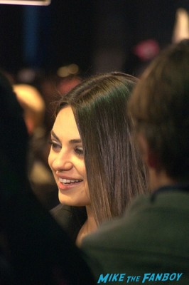 Mila Kunis signed autograph signing autographs for fans at the oz the great and powerful london movie premiere