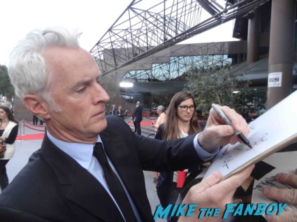 john slattery signing autographs at the mad men season 6 premiere in hollywood