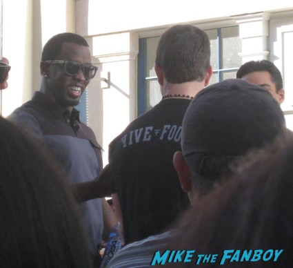 Marky Mark Wahlberg and Puff Daddy taping an episode of EXTRA at the grove