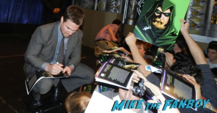 stephen Amell signing autographs for fans at arrow paleyfest stephen amell signing autographs shirtless poste 164