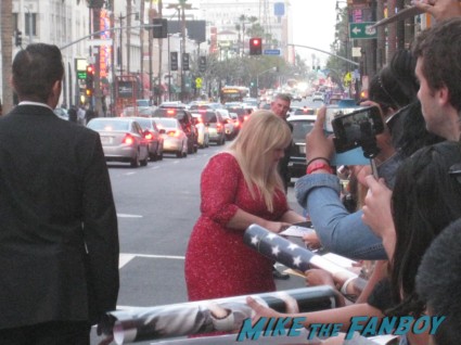 rebel wilson signing autographs  at the pain and gain movie premiere with marky mark wahlberg signed autograph rare promo hot 