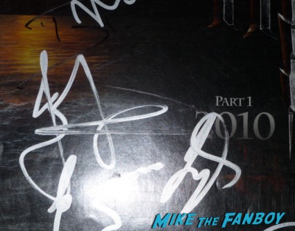 Jason Isaacs signing autographs for fans fan photo signing autographs for fans