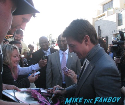 tom cruise signing autographs at Oblivion Movie Premiere red carpet tom cruise prop ship Photo Gallery Preview! Tom Cruise! Morgan Freeman! Autographs! Photos! And More!