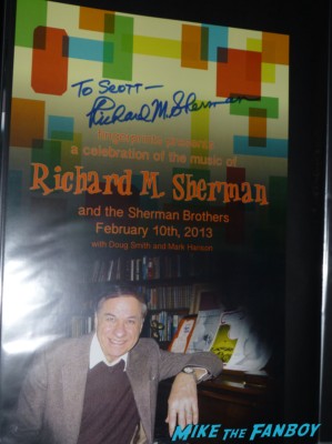 Richard M. Sherman signed cd forgotton dreams signing autographs for fans and playing music at an instore signing