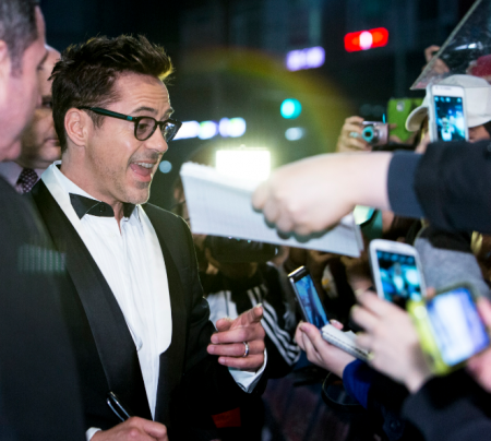 Robert Downey Jr. Signing Autographs for fans at his birthday party event in hollywood