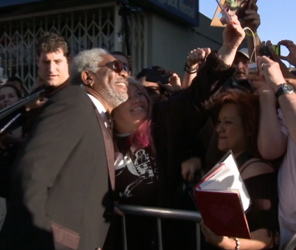 morgan freeman signing autographs and taking photos with fans at the oblivion movie premiere 
