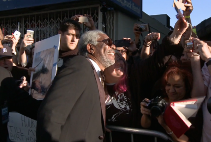 morgan freeman signing autographs and taking photos with fans at the oblivion movie premiere 