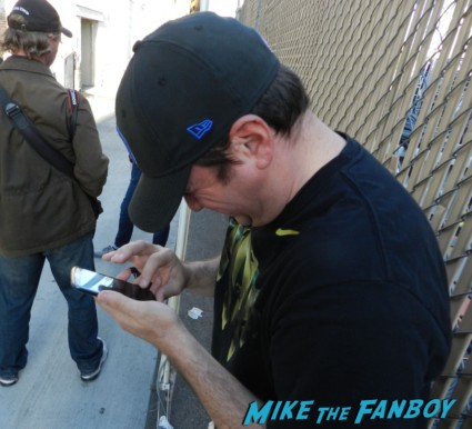 billy beer laughing as patrick dempsey signs autographs patrick dempsey elisabeth moss signing autographs for fans 004