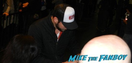 zachary levi from chuck signing autographs for fans at pieces of ass 10th anniversary at the ford theater