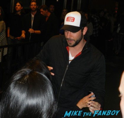 zachary levi from chuck signing autographs for fans at pieces of ass 10th anniversary at the ford theater