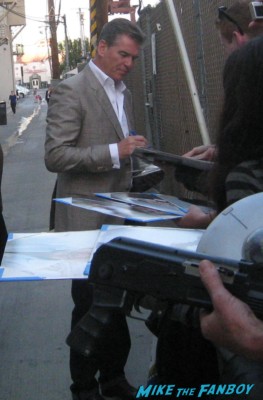 pierce Brosnan signing autographs for fans at jimmy kimmel live signature autograph mars attacks 007 rare promo