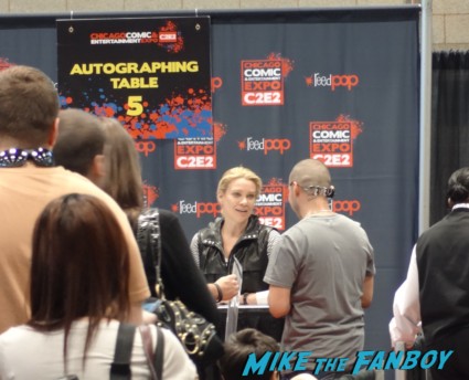 laurie holden from the walking dead at the Chicago Comic and entertainment expo c2e2 banner logo rare