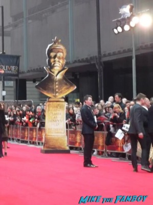 The olivier awards red carpet 2013 with daniel radcliffe kim cattrall rre signing autographs