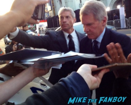 harrison Ford signing autographs for fans at th 42 movie premiere rare