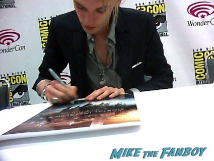 Jamie Campbell-Bower signing autographs at the Mortal Instruments autograph signing Cassandra Clare! Lily Collins! Jamie Campbell-Bower! Kevin Zegers! Autographs! Photos! More!