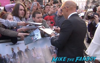 Vin Diesel signing autographs Fast And Furious 6 London UK Premiere Report & Photo Gallery! Paul Walker! Luke Evans! Vin Diesel! Michelle Rodriguez! Jordana Brewster! Ludacris! Tyrese! Autographs! Photos! And More!