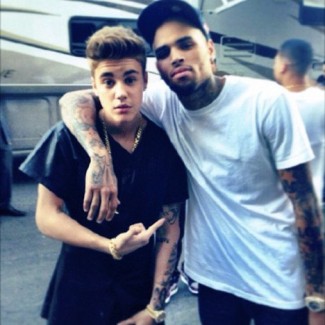 chris brown justin bieber bros photo in front of their plane two douches