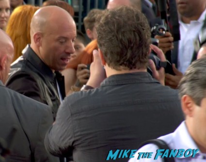 vin diesel on the red carpet  signing autographs at fast and furious 6 premiere red carpet vin diesel signing autographs (23)