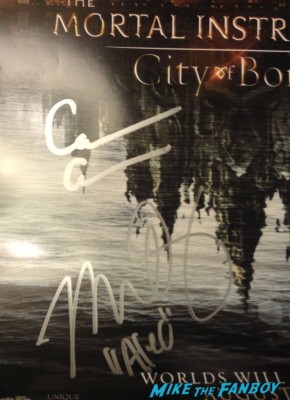 Mortal instruments signed autograph mini poster wondercon lily collins signing autographs at the Mortal Instruments autograph signing Cassandra Clare! Lily Collins! Jamie Campbell-Bower! Kevin Zegers! Autographs! Photos! More!