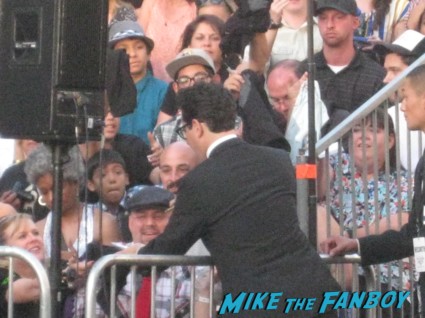 j.j. abrams signing autographs at the  arriving to the star trek into darkness los angeles premeire chris pine zoe saldana