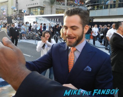 Chris Pine signing autographs at the star trek into darkness movie premiere signing autographs chris 095