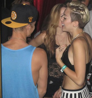 Miley cyrus and justin Bieber hanging out and chilling
