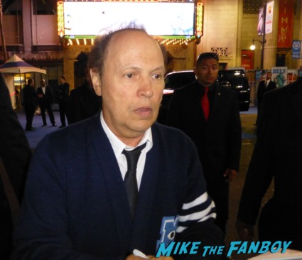 Billy Crystal signing autographs for fans Monsters university premiere marquee sign rare billy crystal