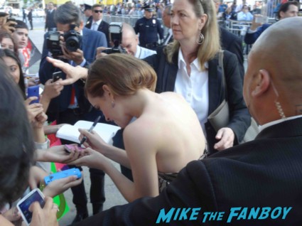 emma watson signing autographs for fans at the this is the end movie premiere