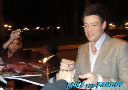 Corey Monteith signing autographs for fans at a glee screening at outfest