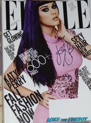 Katy Perry signed Elle magazine autograph The Smurfs 2 premiere katy perry signing autographs for fans