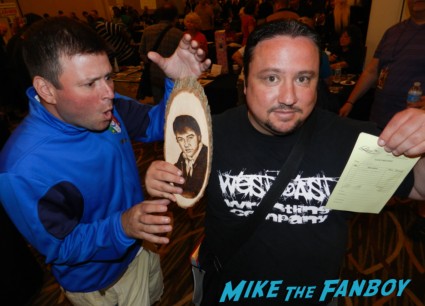 elvis wood a carved sculpture of elvis on a piece of wood meeting william ragsdale krity mcnichol signing autographs holly 017