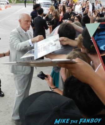 John Malkovich signing autographs for fans at  red 2 movie premiere red carpet mary louise parker autograph 009