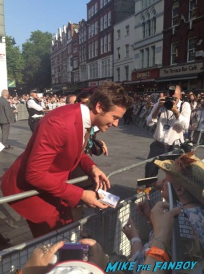 Armie Hammer signing autographs for fans at the uk premiere of The Lone Ranger