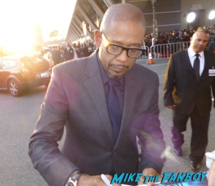Forest Whitaker Signing autographs for fans The Butler movie premiere