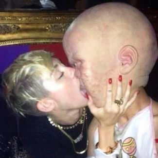 miley cyrus making out with a rare eggplant baby